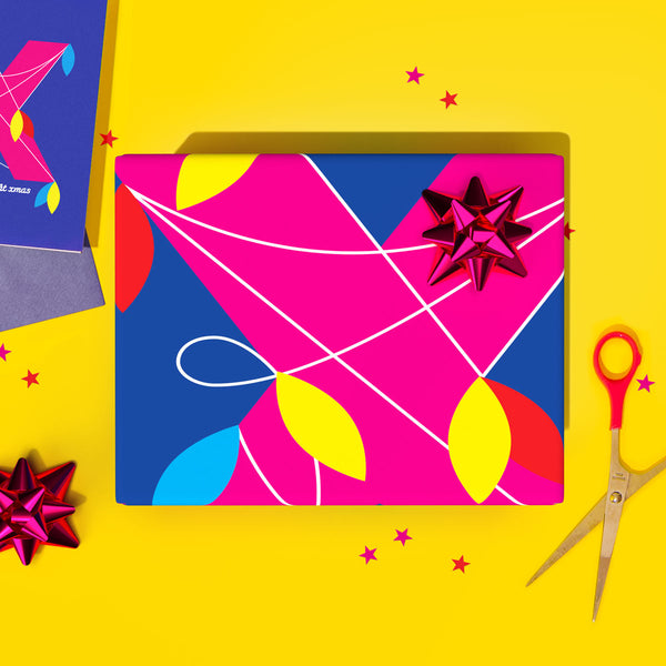 Bright pink, yellow and purple christmas gift wrap present