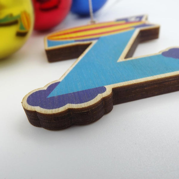closeup typographic laser cut plywood letter z christmas tree decoration