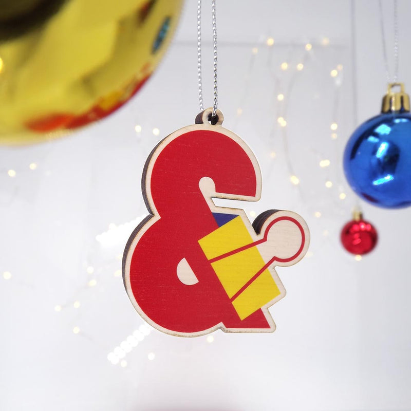typographic laser cut red plywood ampersand christmas tree decoration