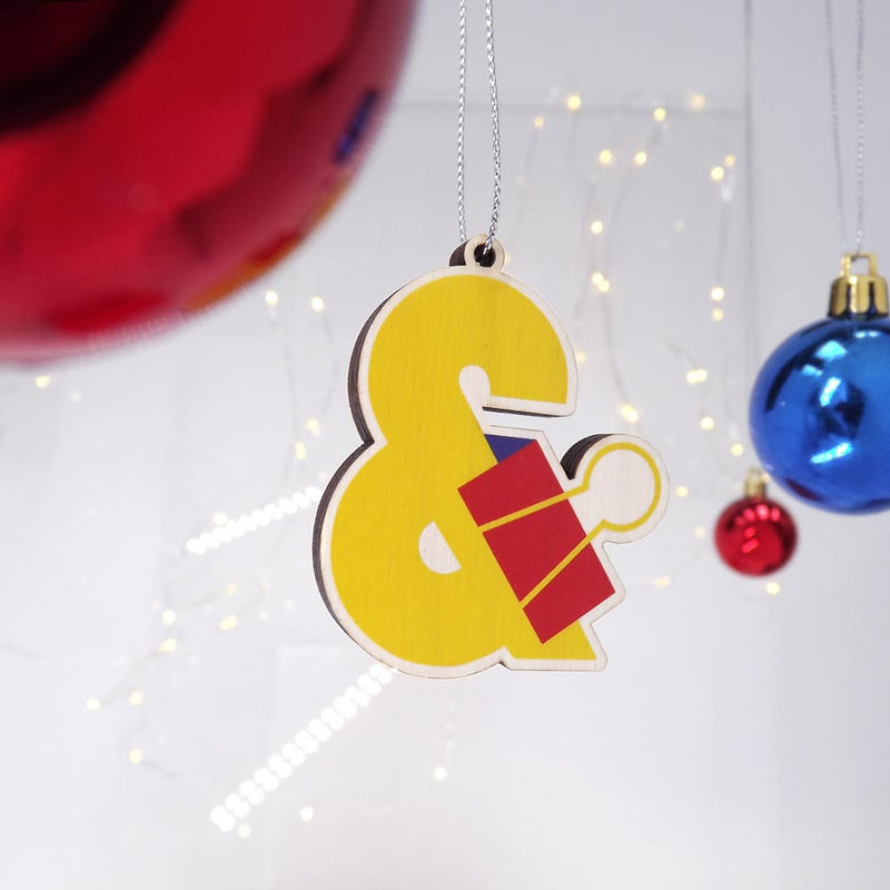 typographic laser cut yellow plywood ampersand christmas tree decoration
